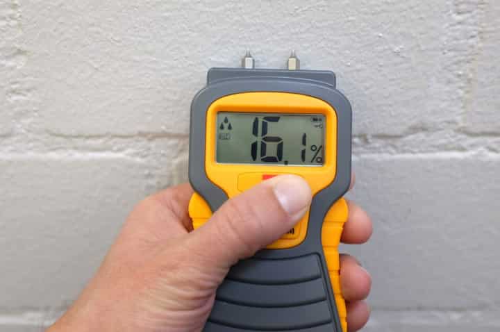 A meter is used for professional testing of mold infestation in a home in Jackson City, TN.